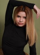 Armena thumbnail - Latin escort London in a black ruched dress
