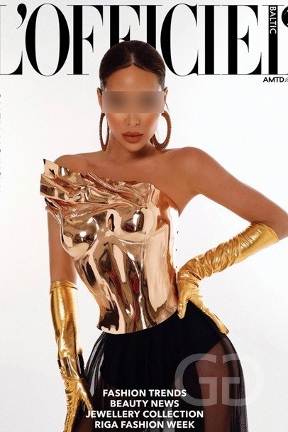 Veronica in a gold metallic bustier and long gold gloves, magazine cover shoot