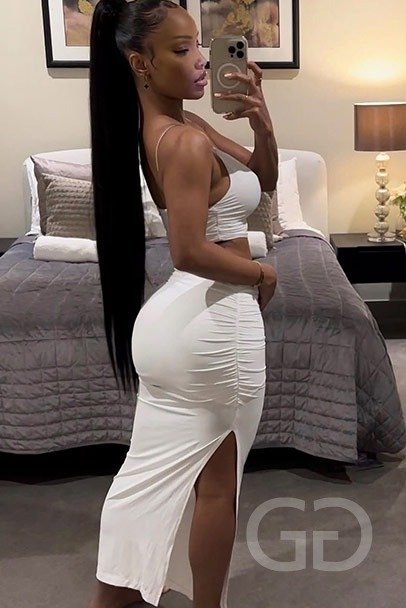 Beatriz mirror selfie in a white crop top and ruched midi skirt