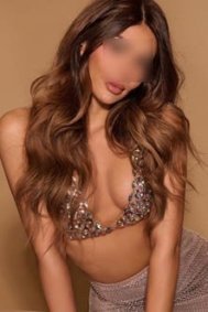 Ranya thumbnail - long wavy hair and a jewelled bralette