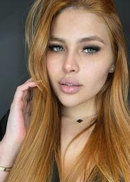Gaby thumbnail - close-up selfie with long strawberry blonde hair